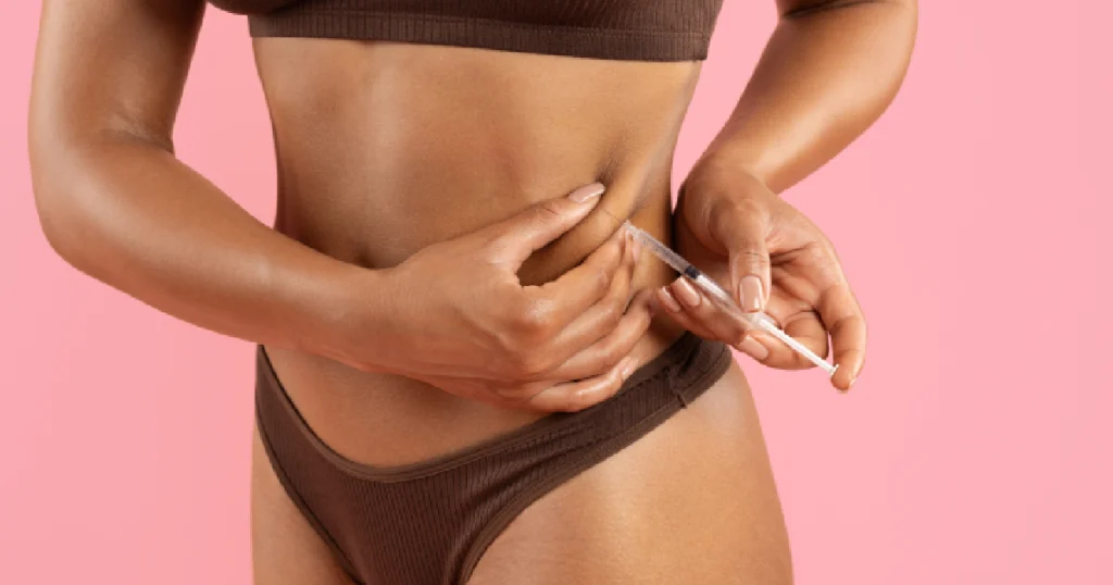 Woman Administering Weight Loss Injection in Stomach Area in Hickory, NC | Leigh Ashton Aesthetics